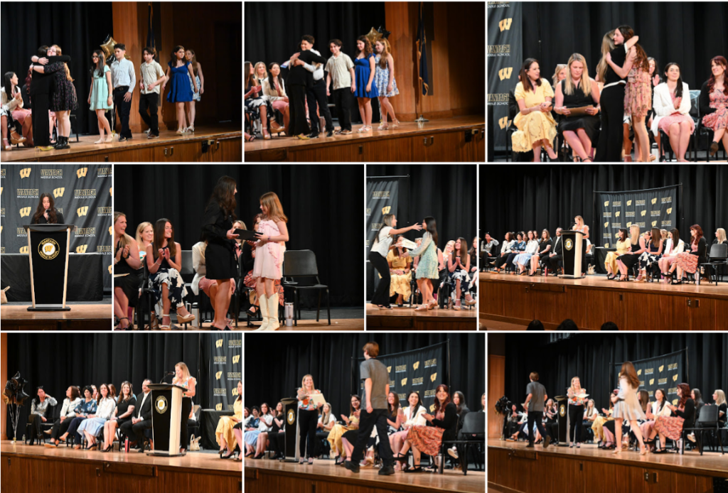 students receiving awards on stage